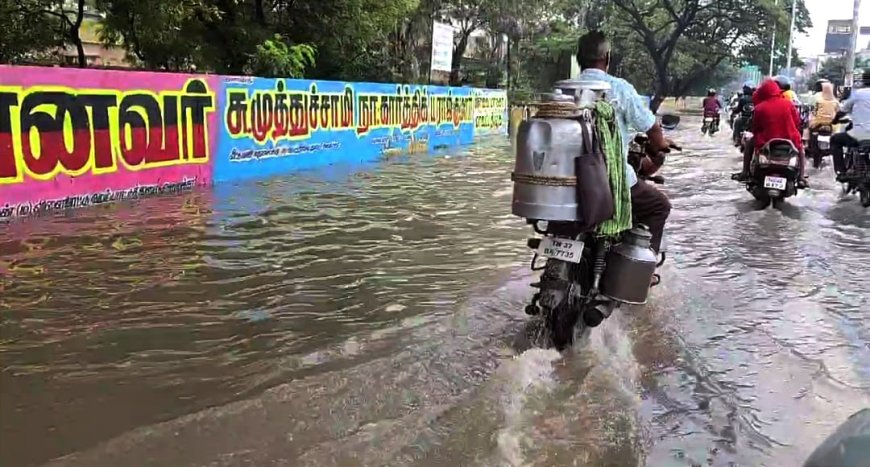 கோவை வேளாண் பல்கலைக் கழகம், சாலையில் புகுந்த மழை நீர் - வெள்ளத்தில் தத்தளித்து செல்லும் வாகன ஓட்டிகள்